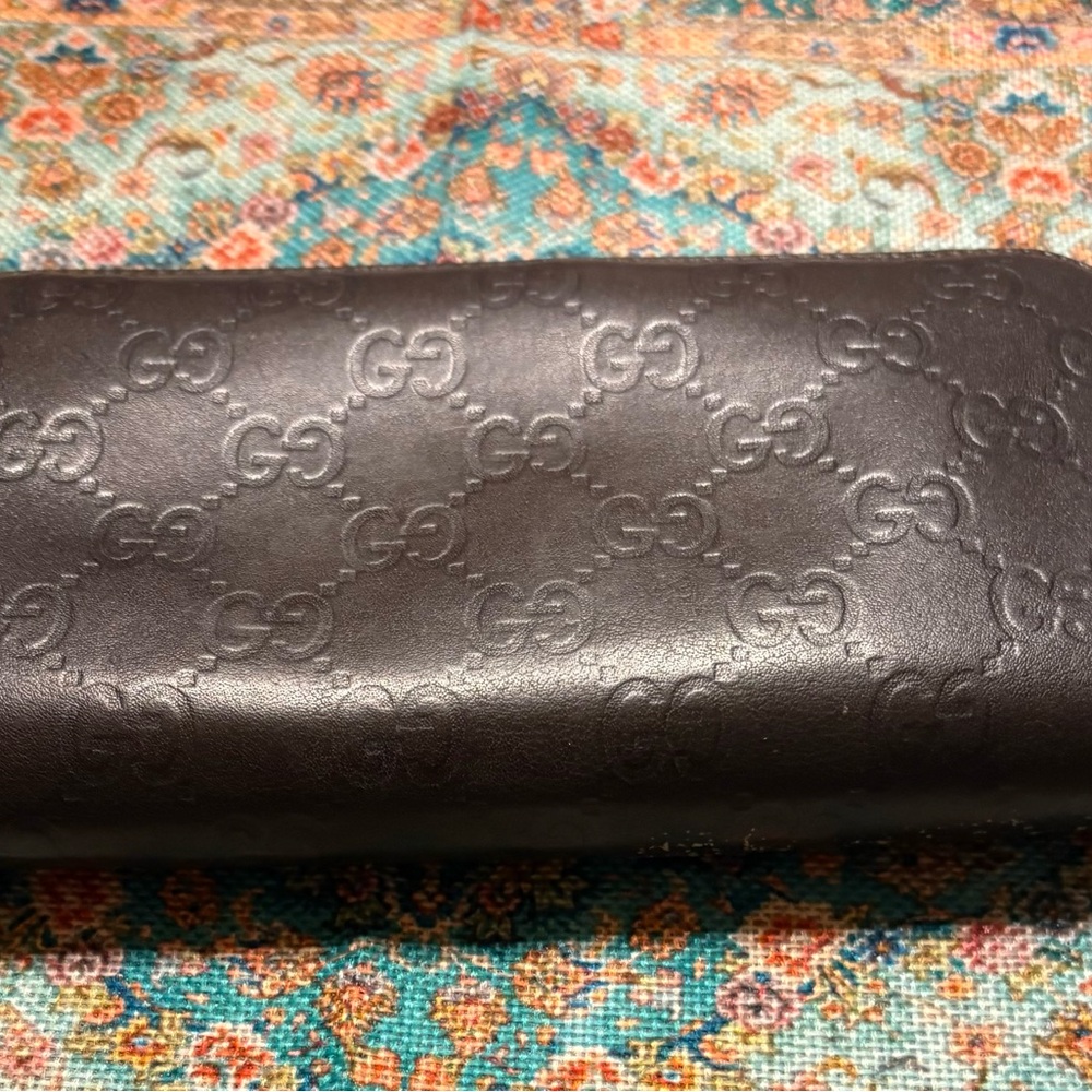 Gucci Black Guccissima Embossed Leather Wallet